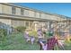 View of backyard with a fire pit, Adirondack chairs, and a privacy fence at 249 Brookshire Rd, Goose Creek, SC 29445