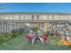 Fenced backyard area with a fire pit and Adirondack chairs; ideal for entertaining at 249 Brookshire Rd, Goose Creek, SC 29445