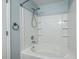 Bathroom features a white tiled shower and tub combination with toiletry shelves at 249 Brookshire Rd, Goose Creek, SC 29445