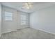 Neutral bedroom showcasing plush carpet, neutral walls and large windows at 249 Brookshire Rd, Goose Creek, SC 29445