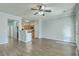Spacious living room featuring hardwood floors, an open floorplan, and seamless transition to the kitchen at 249 Brookshire Rd, Goose Creek, SC 29445