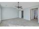 Spacious main bedroom with ceiling fan and a connected bathroom at 249 Brookshire Rd, Goose Creek, SC 29445