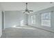 Spacious main bedroom with natural light, ceiling fan and plush carpet at 249 Brookshire Rd, Goose Creek, SC 29445