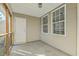 Covered screened porch offering a relaxing outdoor space with door and windows at 249 Brookshire Rd, Goose Creek, SC 29445
