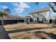 Lush backyard showcasing a home's exterior with a patio and spacious lawn, perfect for outdoor enjoyment at 2825 Backman St, Mount Pleasant, SC 29466