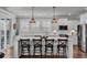Bright kitchen with white cabinets, quartz countertops, an island, and pendant lighting at 2825 Backman St, Mount Pleasant, SC 29466