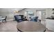 Spacious living room featuring comfortable seating, TV, bar area, and an inviting open layout at 2825 Backman St, Mount Pleasant, SC 29466