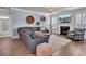 Stylish living room featuring a fireplace, decorative wall accents, and plush seating that creates a cozy atmosphere at 2825 Backman St, Mount Pleasant, SC 29466