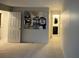 Spacious bedroom featuring neutral carpet and paint, and a hallway leading to a full bathroom at 291 Sea Cloud Cir # 291, Edisto Island, SC 29438