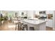 Modern open-concept kitchen with granite countertops and stainless steel appliances at 301 Pine Crest View Dr, Summerville, SC 29486