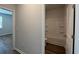 Bright bathroom view featuring a combo tub and shower, with stylish gray paint and luxury vinyl plank flooring at 321 Blue Haw Dr, Moncks Corner, SC 29461