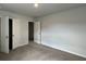 Bedroom features neutral walls, carpet, and closet space at 321 Blue Haw Dr, Moncks Corner, SC 29461