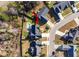 Aerial view of a home with a private backyard pool and fenced yard at 322 Equinox Cir, Ladson, SC 29456