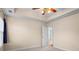 Spacious bedroom featuring neutral walls, ceiling fan, and doorway leading to another room at 322 Equinox Cir, Ladson, SC 29456