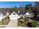 Well-kept one-story home with a well-maintained lawn and two car garage at 322 Equinox Cir, Ladson, SC 29456