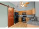 Beautiful kitchen showcasing stainless appliances, granite countertops, and wooden cabinets at 322 Equinox Cir, Ladson, SC 29456