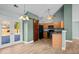 Bright kitchen featuring wooden cabinets, stainless appliances, and an adjacent dining area at 322 Equinox Cir, Ladson, SC 29456