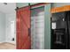 Pantry with sliding barn door and wire rack storage at 322 Equinox Cir, Ladson, SC 29456