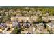 Aerial view of a home nestled among trees, showcasing the neighborhood's serene environment at 3334 Merion Pl, Mount Pleasant, SC 29466