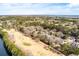 Beautiful aerial view of a home with a golf course nearby, showcasing the scenic landscape at 3334 Merion Pl, Mount Pleasant, SC 29466