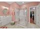 Light and airy bathroom featuring a glass enclosed shower and generous vanity with a sink and white cabinets at 3334 Merion Pl, Mount Pleasant, SC 29466