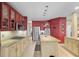 Bright kitchen boasts stainless steel appliances, spacious island, and granite countertops at 3334 Merion Pl, Mount Pleasant, SC 29466
