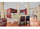 Modern kitchen boasts granite countertops, stainless steel appliances, and an open layout, ideal for entertaining at 3334 Merion Pl, Mount Pleasant, SC 29466