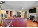 Spacious living room with hardwood floors, fireplace, and an open floor plan at 3334 Merion Pl, Mount Pleasant, SC 29466