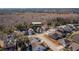 Community aerial view of homes on tree-lined streets with lush greenery; a peaceful residential setting at 3920 Hanoverian Dr, Mount Pleasant, SC 29429