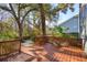 Spacious backyard wooden deck perfect for entertaining, overlooking the yard at 3920 Hanoverian Dr, Mount Pleasant, SC 29429