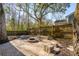 This backyard has a paver patio featuring a central brick fire pit at 3920 Hanoverian Dr, Mount Pleasant, SC 29429