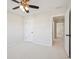 Spacious bedroom with a ceiling fan and access to additional rooms at 3920 Hanoverian Dr, Mount Pleasant, SC 29429