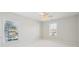 Bedroom with two windows, neutral carpet, and ceiling fan with lights at 3920 Hanoverian Dr, Mount Pleasant, SC 29429