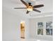 Bedroom featuring a ceiling fan, neutral carpet, and windows providing ample natural light at 3920 Hanoverian Dr, Mount Pleasant, SC 29429