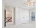Bright bedroom with a ceiling fan, closet and a view of the staircase at 3920 Hanoverian Dr, Mount Pleasant, SC 29429