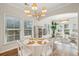 Bright dining room with chandelier lighting, and seating for six at 3920 Hanoverian Dr, Mount Pleasant, SC 29429