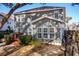 Exterior angle of a two-story home featuring a lush lawn and wooden backyard deck at 3920 Hanoverian Dr, Mount Pleasant, SC 29429