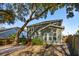 This two-story home has lush landscaping with a charming backyard deck at 3920 Hanoverian Dr, Mount Pleasant, SC 29429