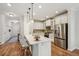 Open kitchen with an island, stainless steel appliances, and pendant lighting at 3920 Hanoverian Dr, Mount Pleasant, SC 29429
