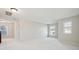 Spacious living room with two windows and view of the hallway at 3920 Hanoverian Dr, Mount Pleasant, SC 29429