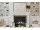 Cozy living room featuring a fireplace, built-in shelves, and stylish decor at 3920 Hanoverian Dr, Mount Pleasant, SC 29429