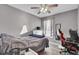 Comfortable bedroom with gray walls, wood flooring, and a ceiling fan at 4516 Logwood Dr, Ladson, SC 29456