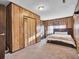 Inviting bedroom with wood paneling and a large closet at 4516 Logwood Dr, Ladson, SC 29456