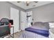Comfortable bedroom with gray walls, wood flooring, and a ceiling fan at 4516 Logwood Dr, Ladson, SC 29456