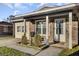 Welcoming front porch featuring neutral brick and inviting entrance at 4516 Logwood Dr, Ladson, SC 29456