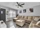 Inviting living room featuring modern decor and a comfortable sectional sofa at 4516 Logwood Dr, Ladson, SC 29456