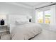 Serene bedroom with plush carpeting, large windows for natural light, and neutral decor at 564 Richfield Way, Summerville, SC 29486