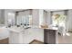 Modern, open kitchen with stainless steel appliances, a breakfast bar, pendant lighting, and an adjacent dining area at 564 Richfield Way, Summerville, SC 29486