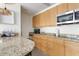 Well-equipped kitchen with stainless steel appliances and granite countertops at 5800 Palmetto Dr # Vg-105, Isle of Palms, SC 29451