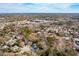 Sprawling aerial view of a neighborhood with a mix of residential properties and dense tree cover at 716 Muirhead Rd, Mount Pleasant, SC 29464